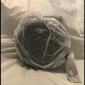 Michael Kors Pebble Leather Circle Canteen Crossbody Bag